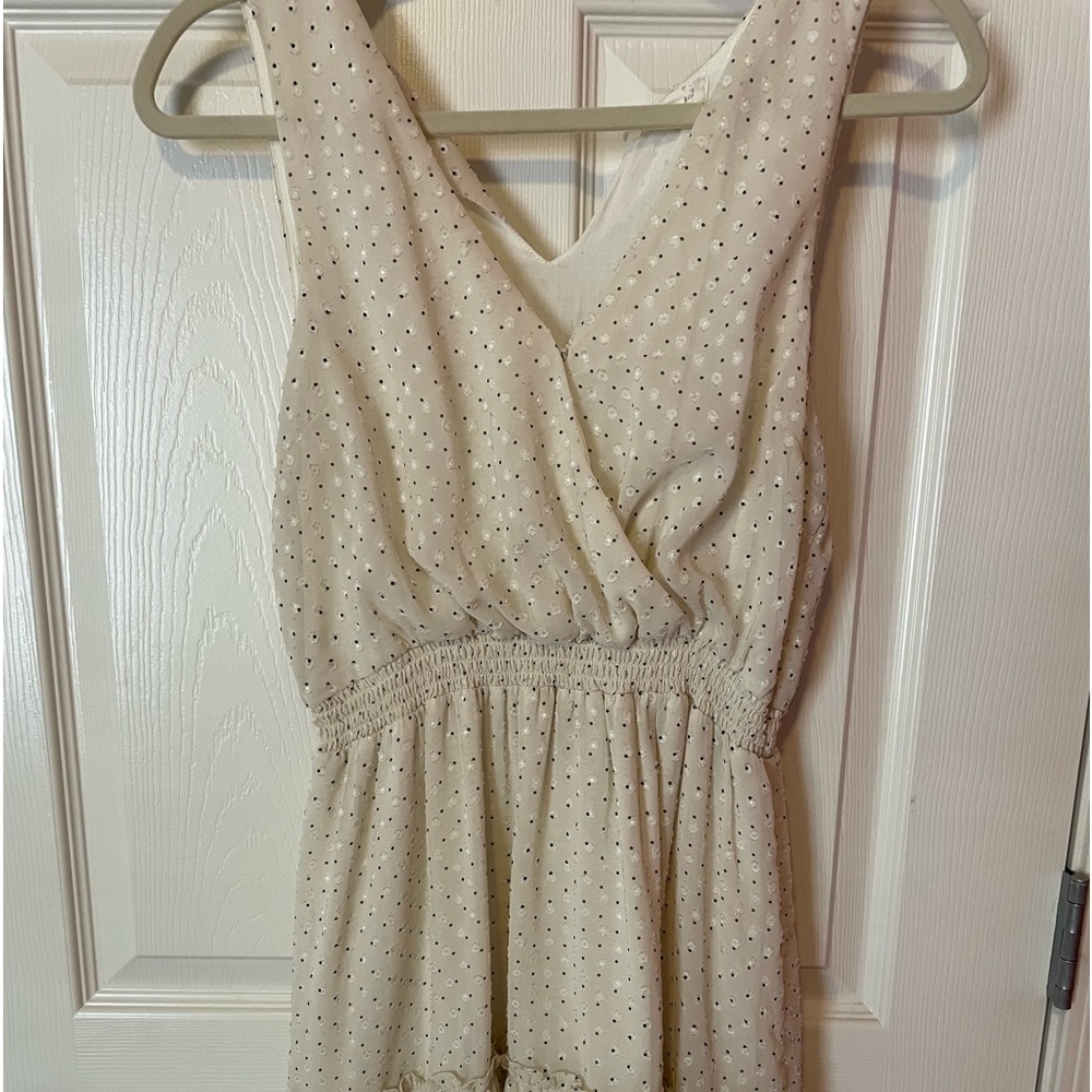 white flowy v-neck dress